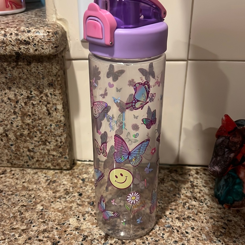 Kids butterfly water bottles used in good shape. Plastic